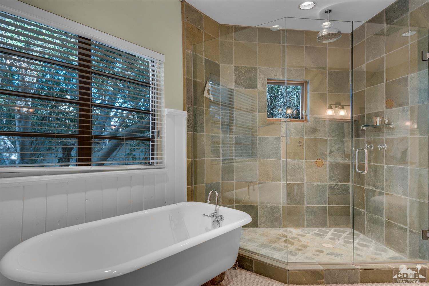72220 Rancho Road Rancho Mirage, CA 92270 - Photo 21 of 24 a bathroom with a bathtub and shower