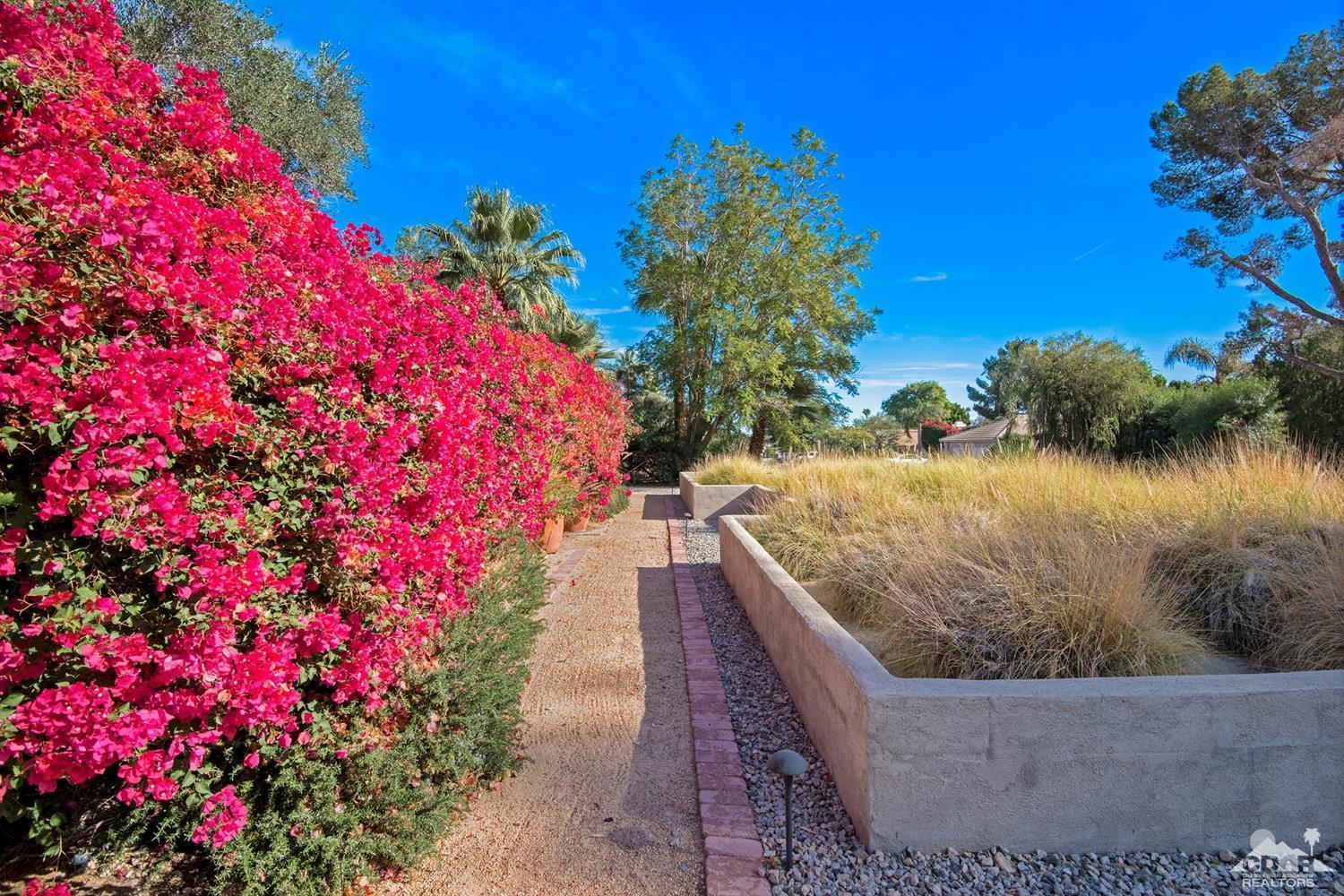72220 Rancho Road Rancho Mirage, CA 92270 - Photo 10 of 24 a view of a pathway with a park