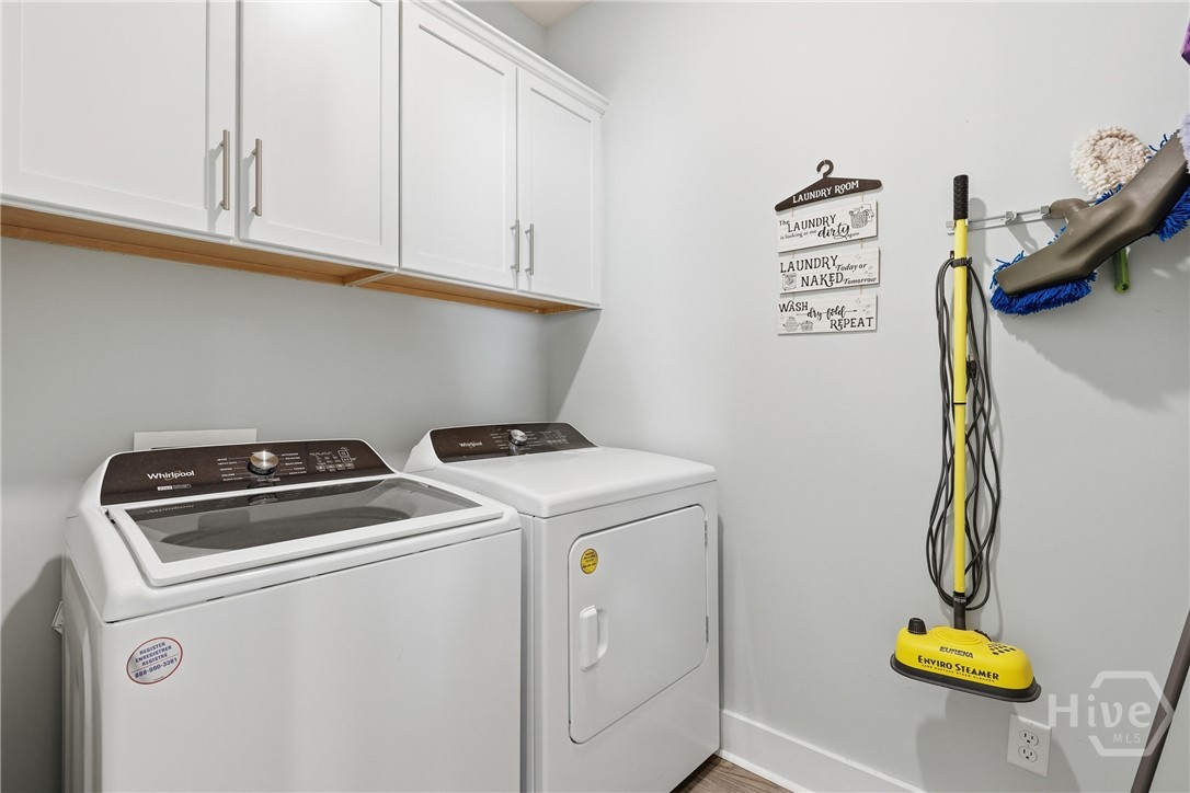 141 Mallory Place Pooler, GA 31322 - Photo 19 of 49 Laundry room with washer and dryer that remain with the home
