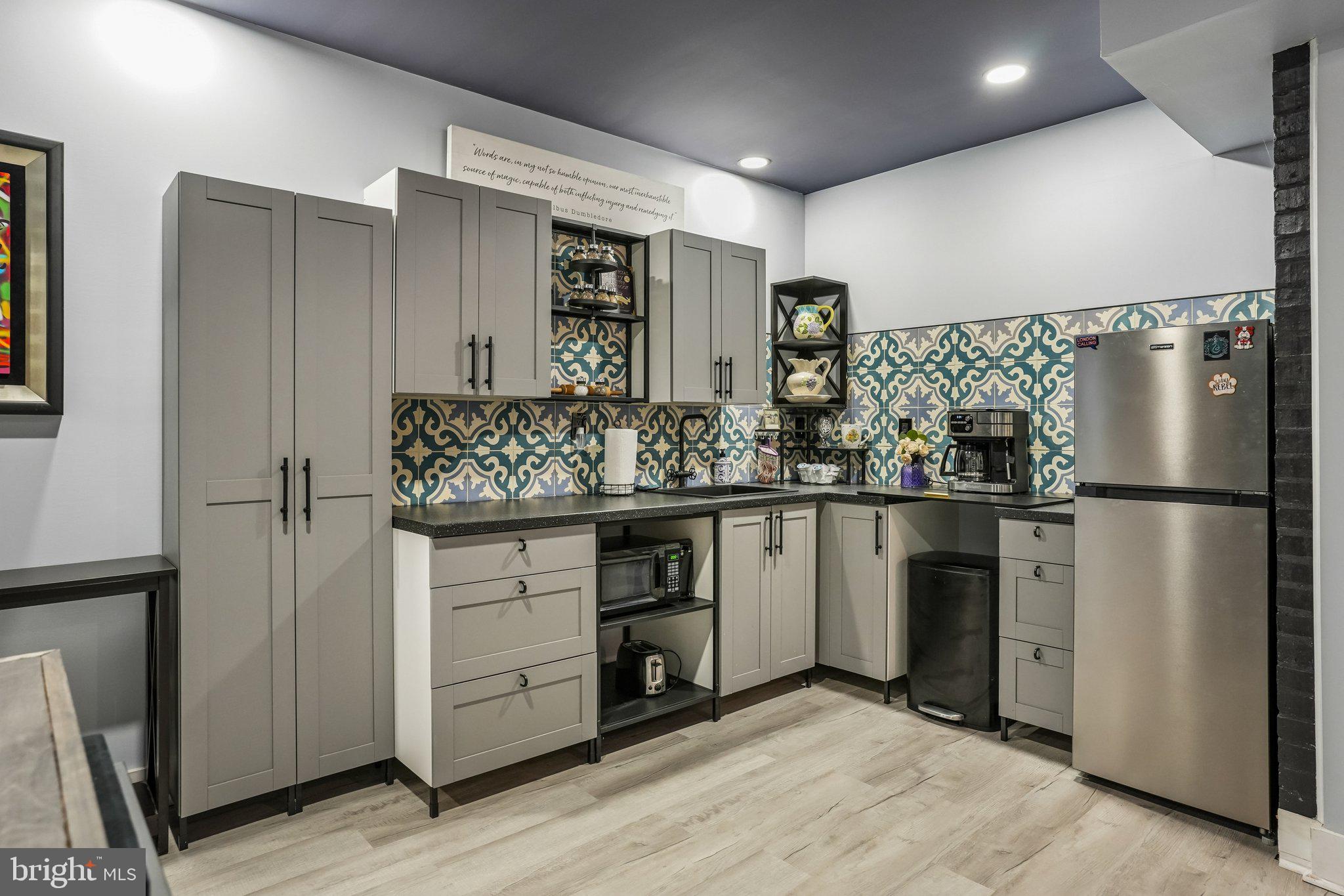 2315 Garwood Road Sicklerville, NJ 08081 - Photo 21 of 33 Modern kitchen with vibrant tiles.