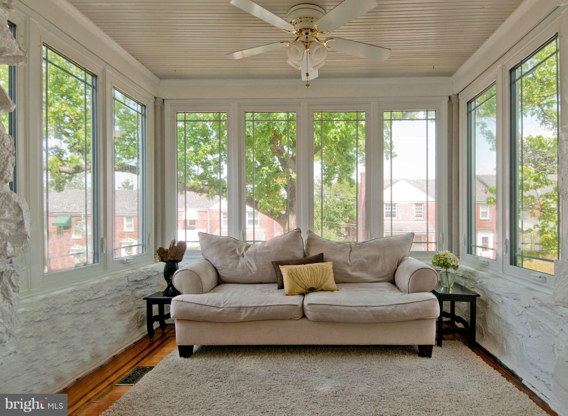 3614 Ednor Road Baltimore, MD 21218 - Photo 3 of 30 a living room with furniture and windows