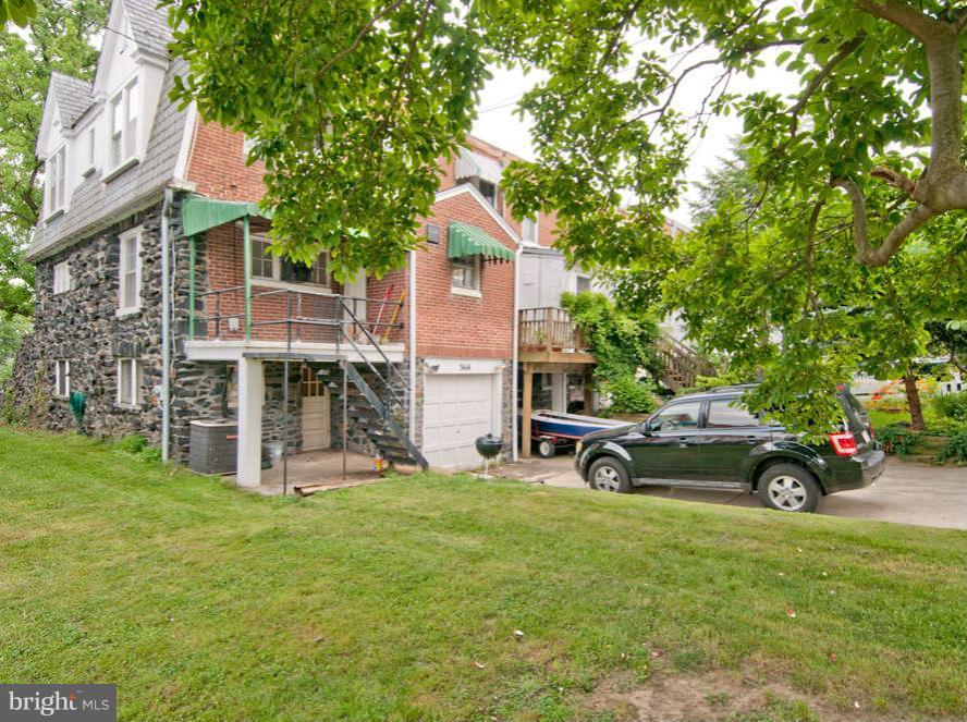 3614 Ednor Road Baltimore, MD 21218 - Photo 29 of 30 a view of a car in front of house