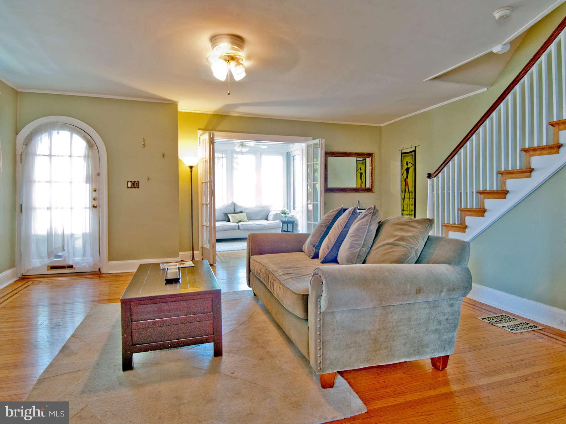 3614 Ednor Road Baltimore, MD 21218 - Photo 7 of 30 a living room with furniture and a large window