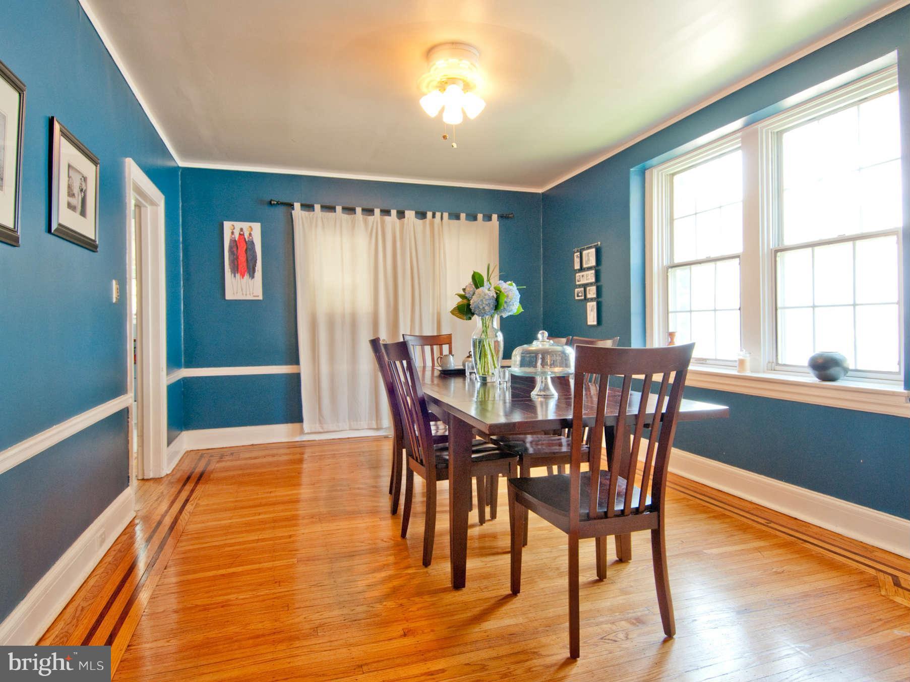 3614 Ednor Road Baltimore, MD 21218 - Photo 9 of 30 a view of a dining room with furniture and wooden floor