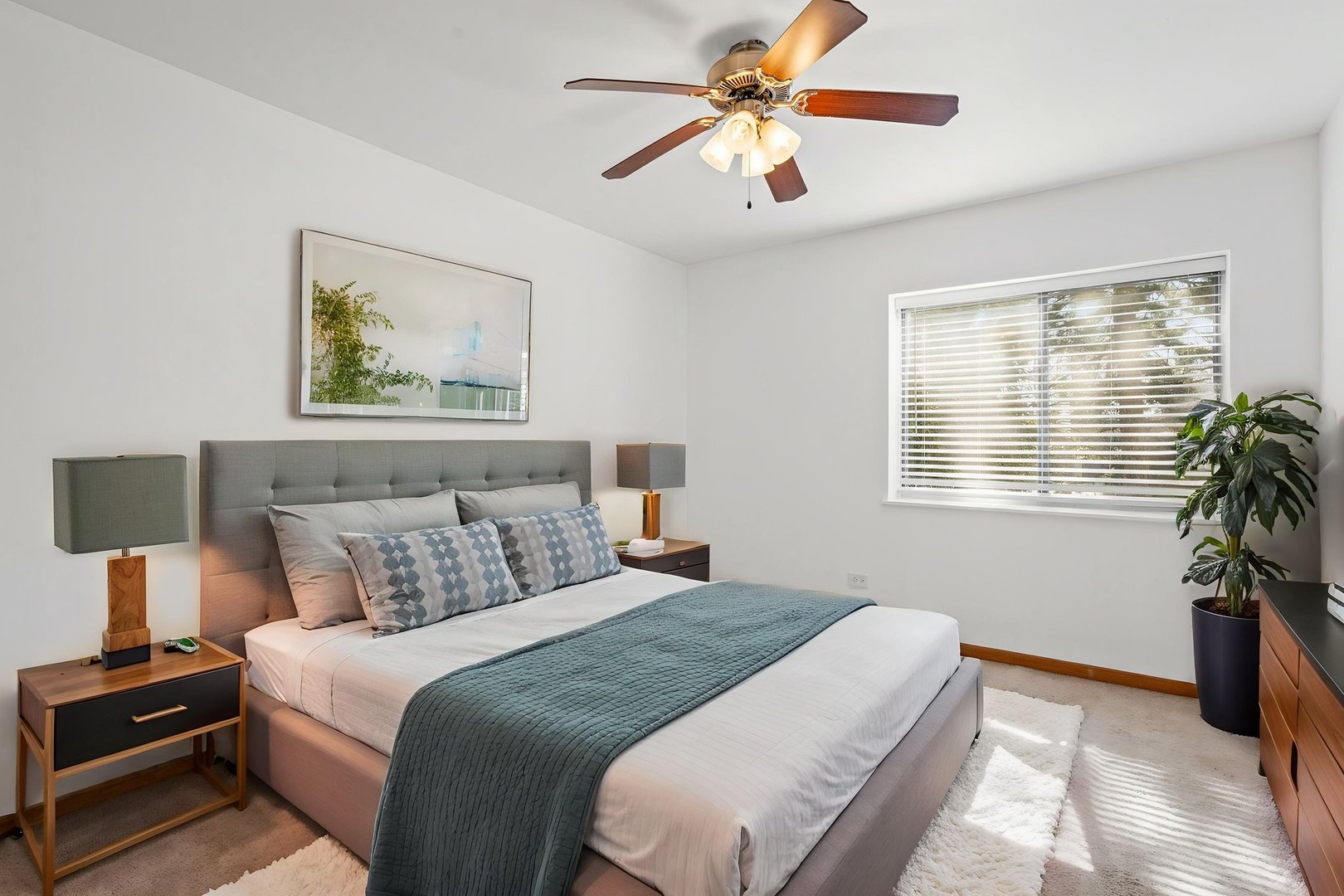 640 Murray Lane, Unit 111 Des Plaines, IL 60016 - Photo 12 of 19 a bedroom with bed and a window