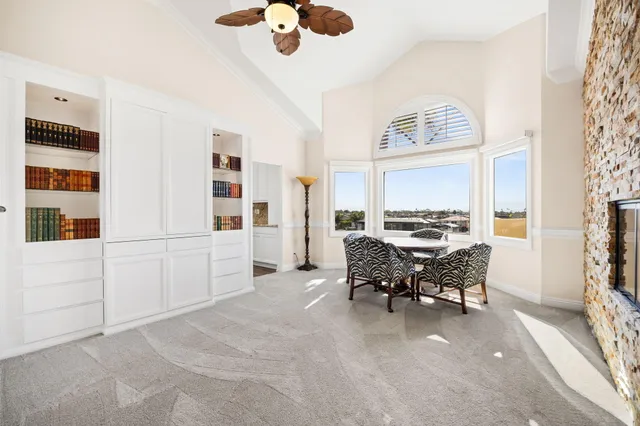 a kitchen with stainless steel appliances granite countertop a stove and a sink