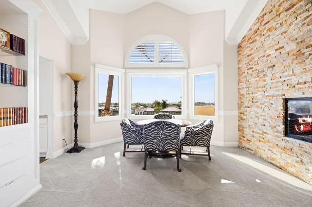 a kitchen with granite countertop a sink and cabinets
