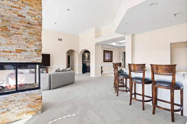 a view of a dining room with furniture and window