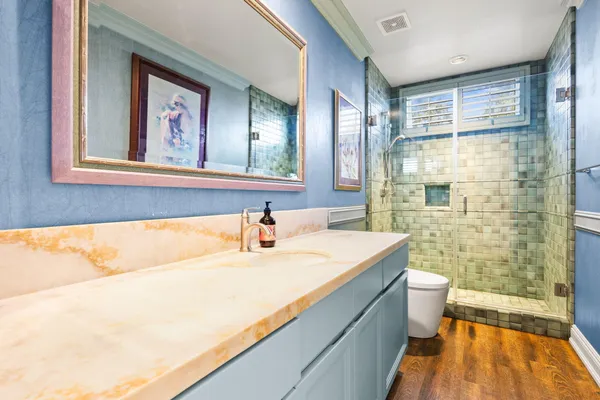 a view of staircase with white walls and a window