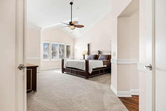 a view of a white house with a outdoor space