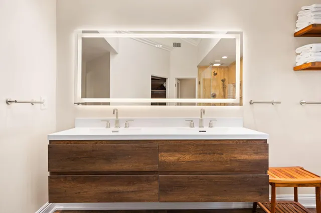 a view of a street with palm trees