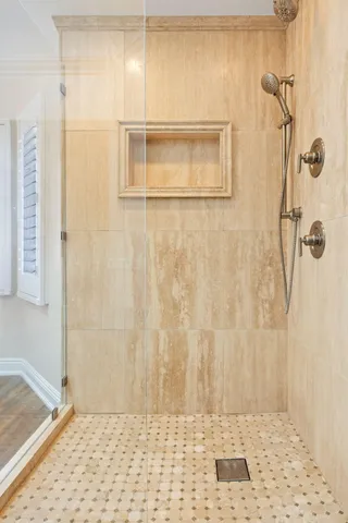 a view of a swimming pool with a lounge chairs