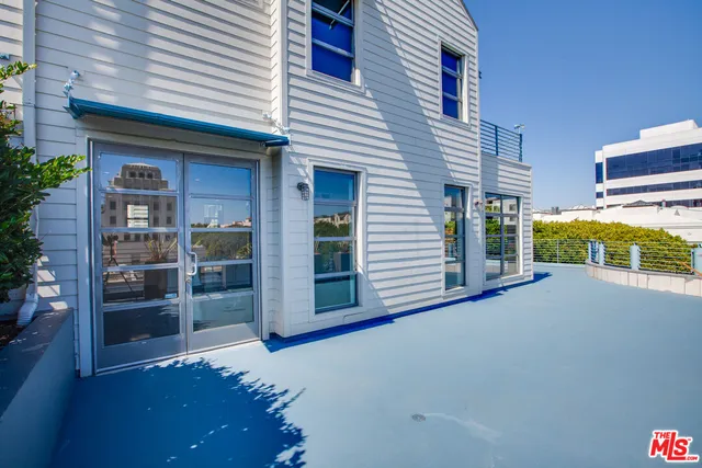 a view of a house with a patio