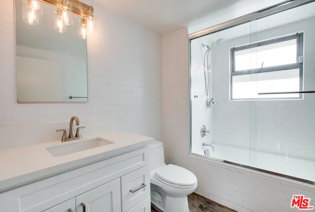 a view of kitchen sink and washer dryer