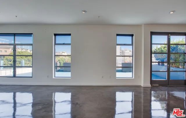 a living room with windows