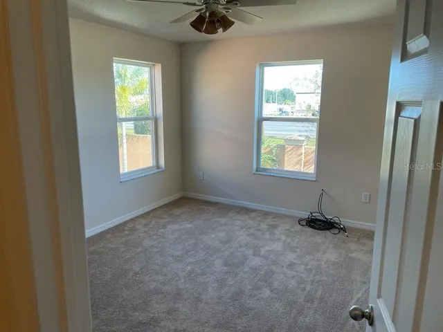 an empty room with windows