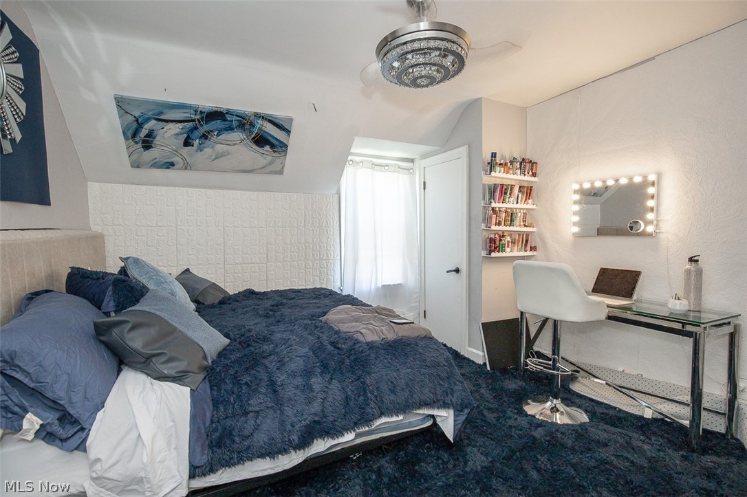 982 Roanoke Road Cleveland Heights, OH 44121 - Photo 27 of 33 Carpeted room with a crystal-adorned ceiling fan.