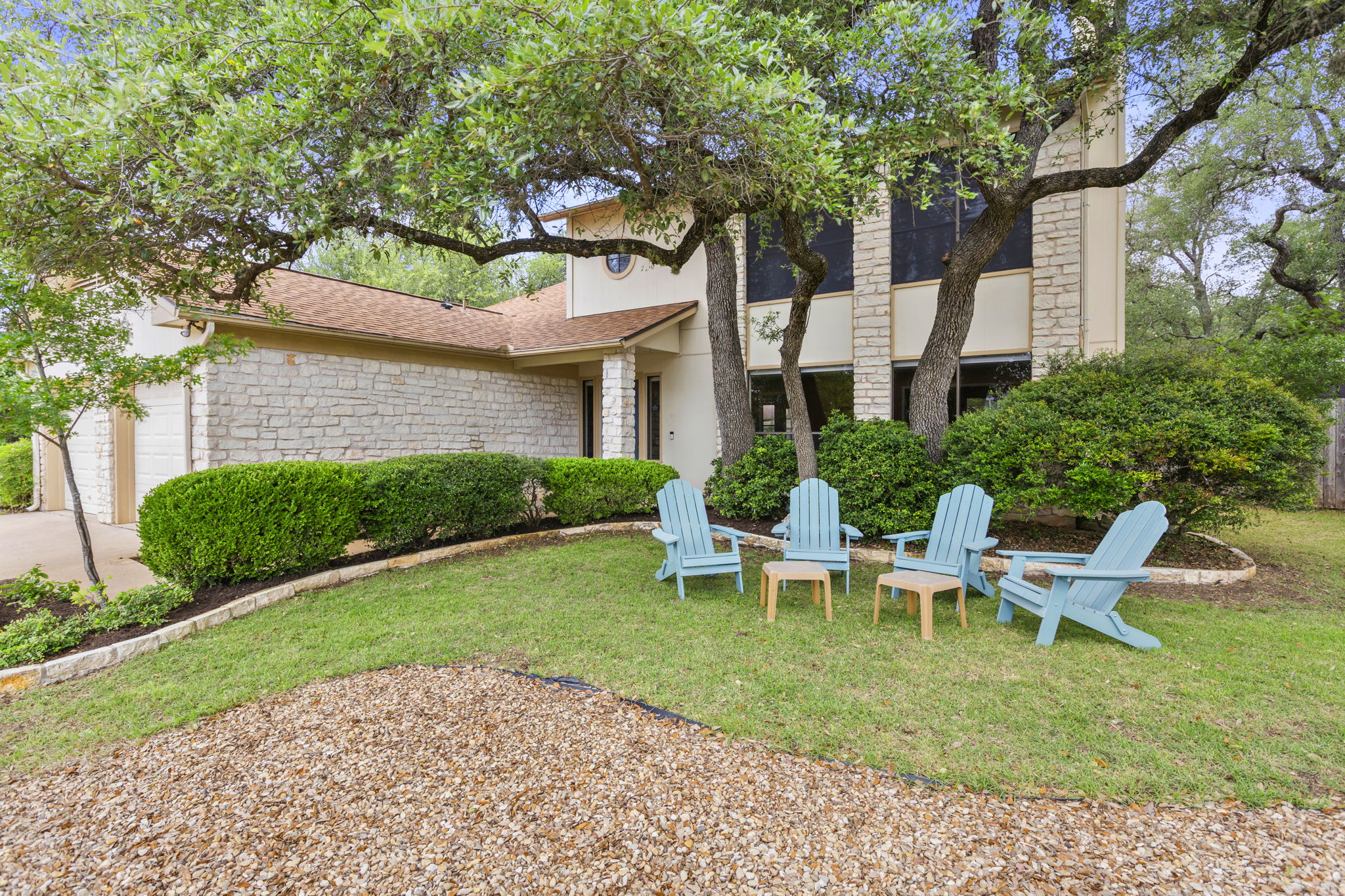 9006 Lockleven Loop Austin, TX 78750 - Photo 1 of 25 a view of a house with backyard sitting area and garden