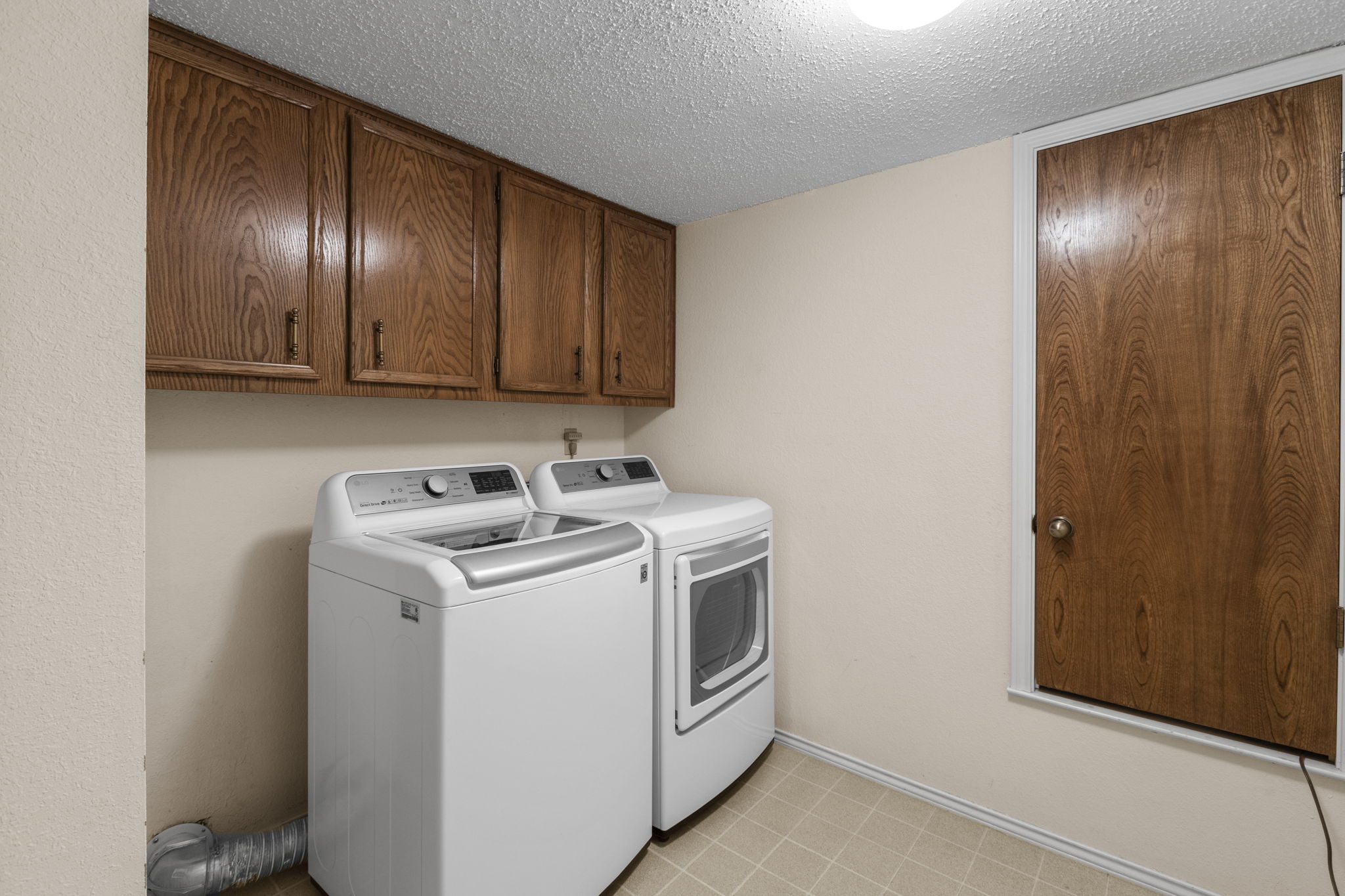 9006 Lockleven Loop Austin, TX 78750 - Photo 12 of 25 a utility room with dryer and washer