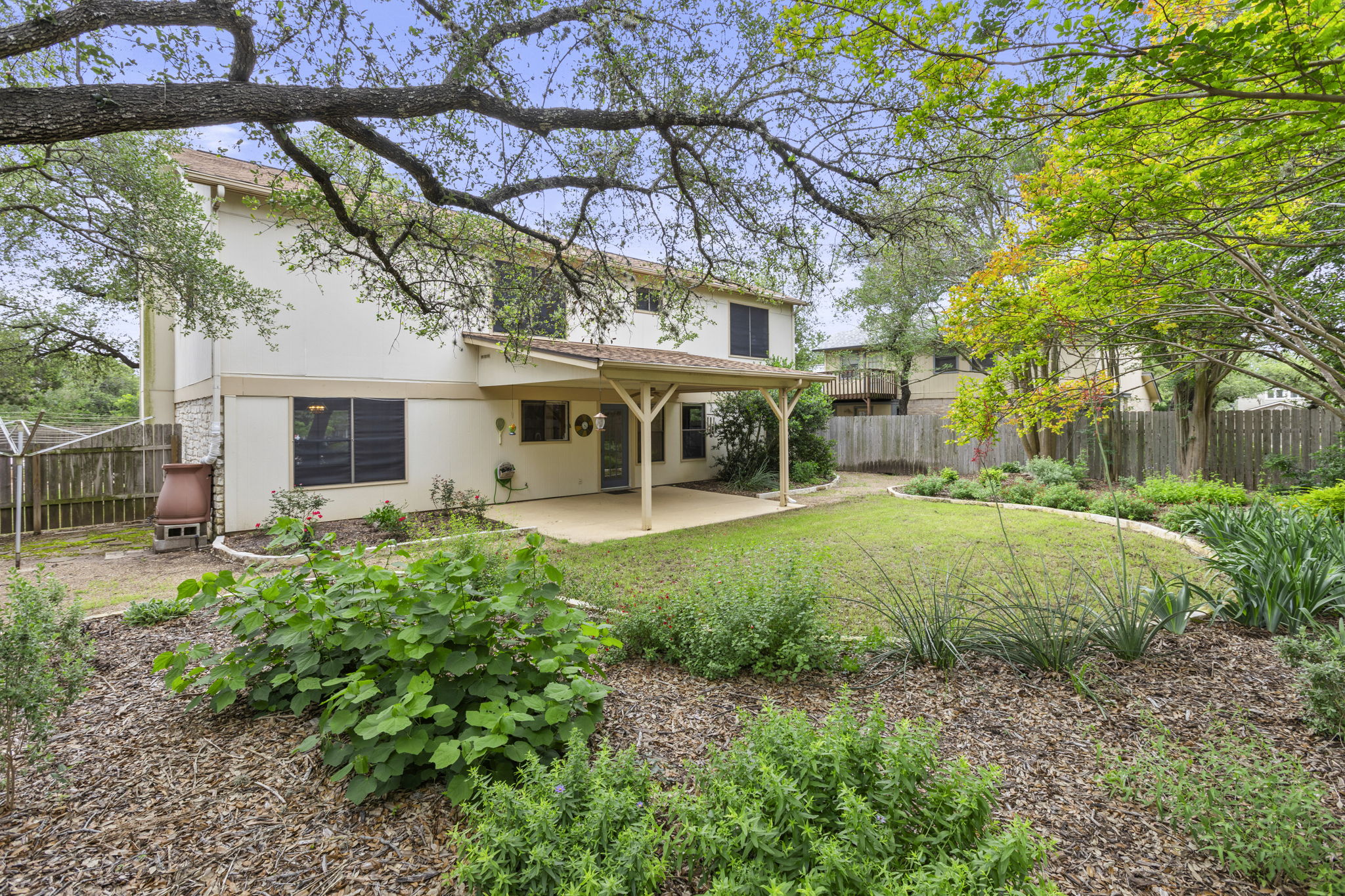 9006 Lockleven Loop Austin, TX 78750 - Photo 13 of 25 front view of a house with a yard