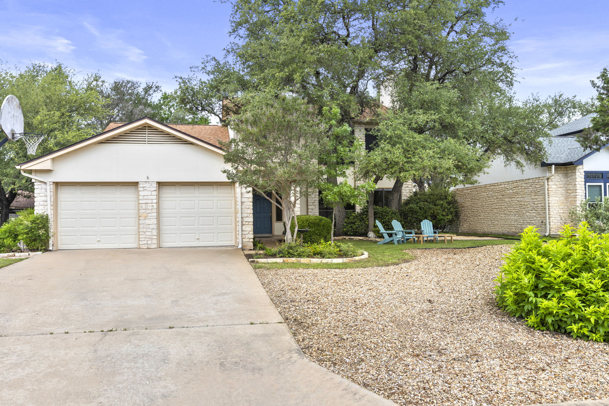 9006 Lockleven Loop Austin, TX 78750 - Photo 16 of 25 a front view of a house with a yard and garage
