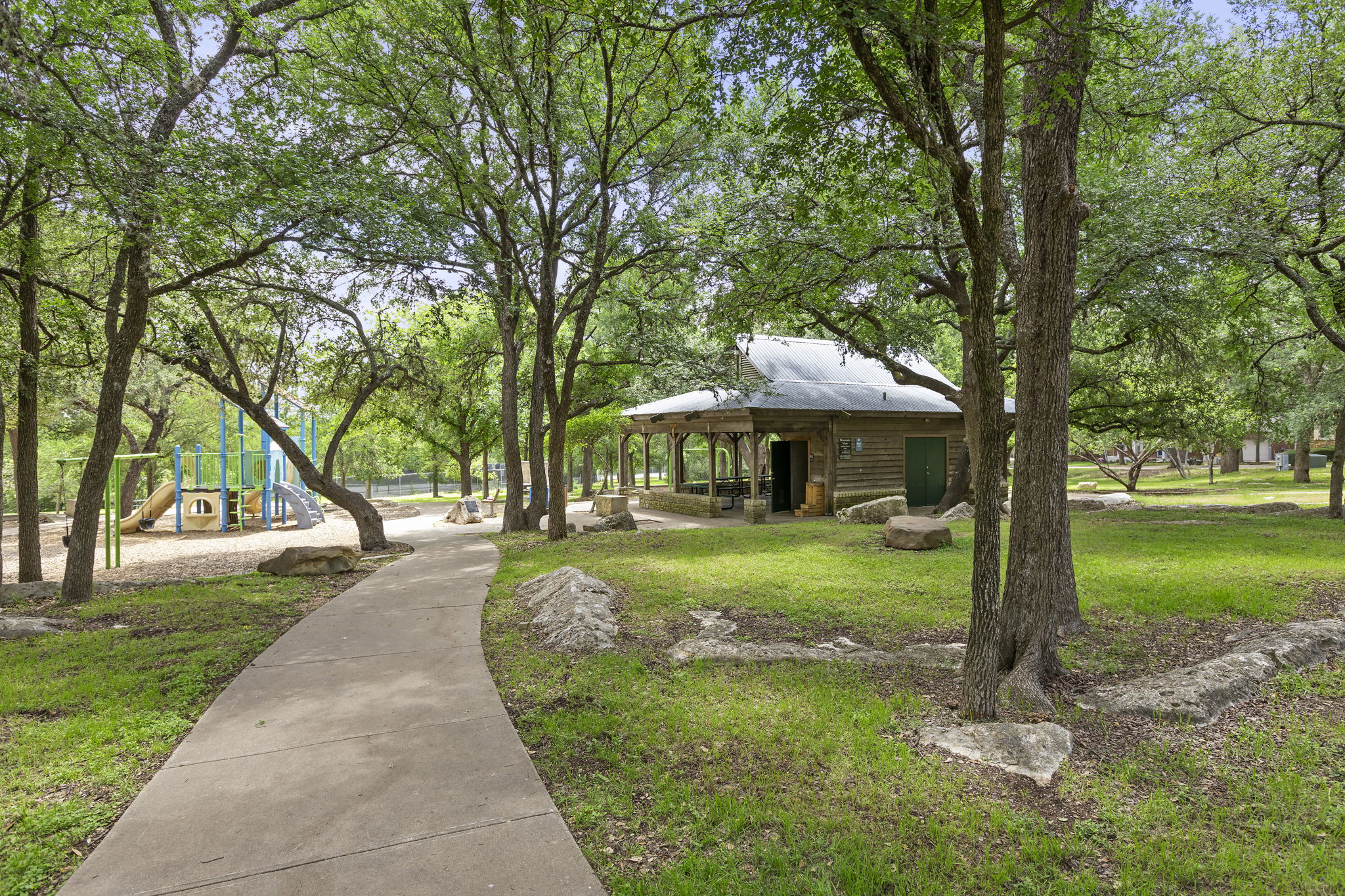9006 Lockleven Loop Austin, TX 78750 - Photo 21 of 25 a view of a park with large trees