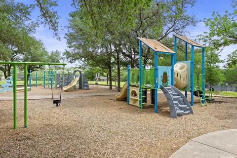 a view of a park with slide