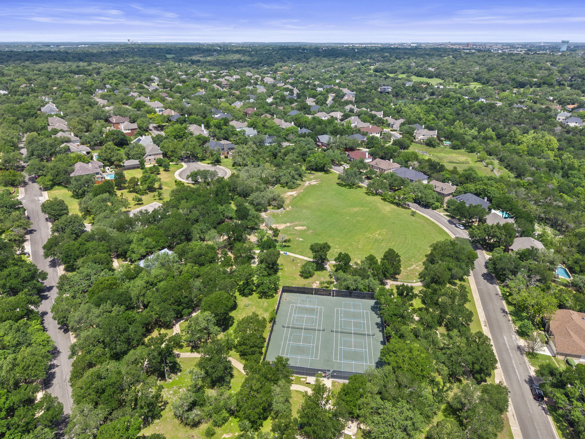 9006 Lockleven Loop Austin, TX 78750 - Photo 24 of 25 an aerial view of a residential houses with outdoor space and trees all around