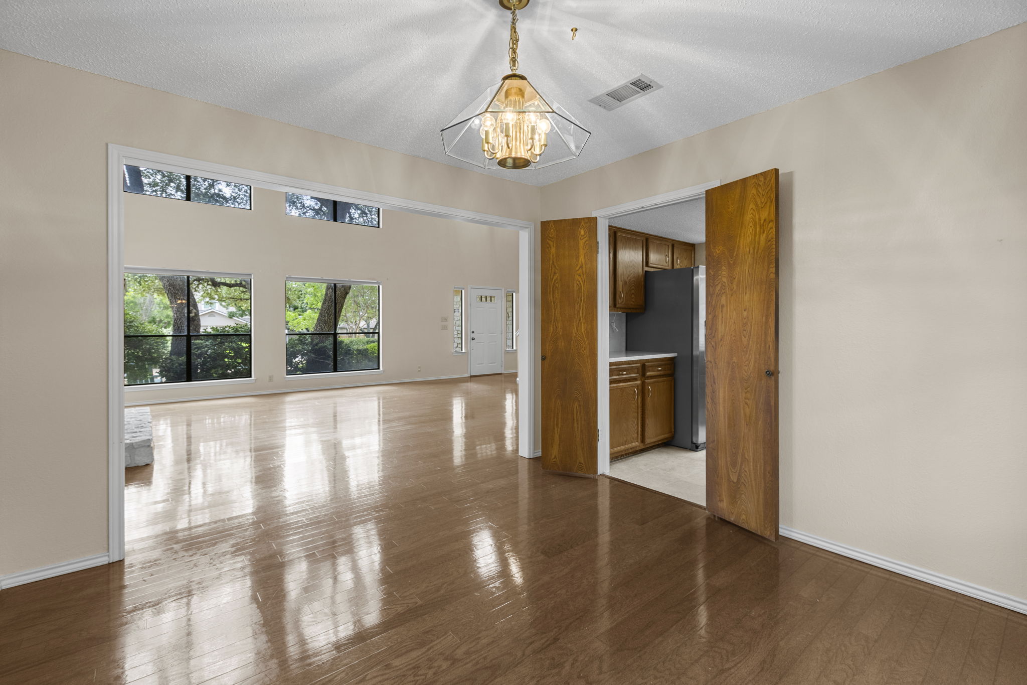 9006 Lockleven Loop Austin, TX 78750 - Photo 7 of 25 a view of an entryway with wooden floor
