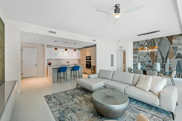a kitchen with a sink stove and refrigerator