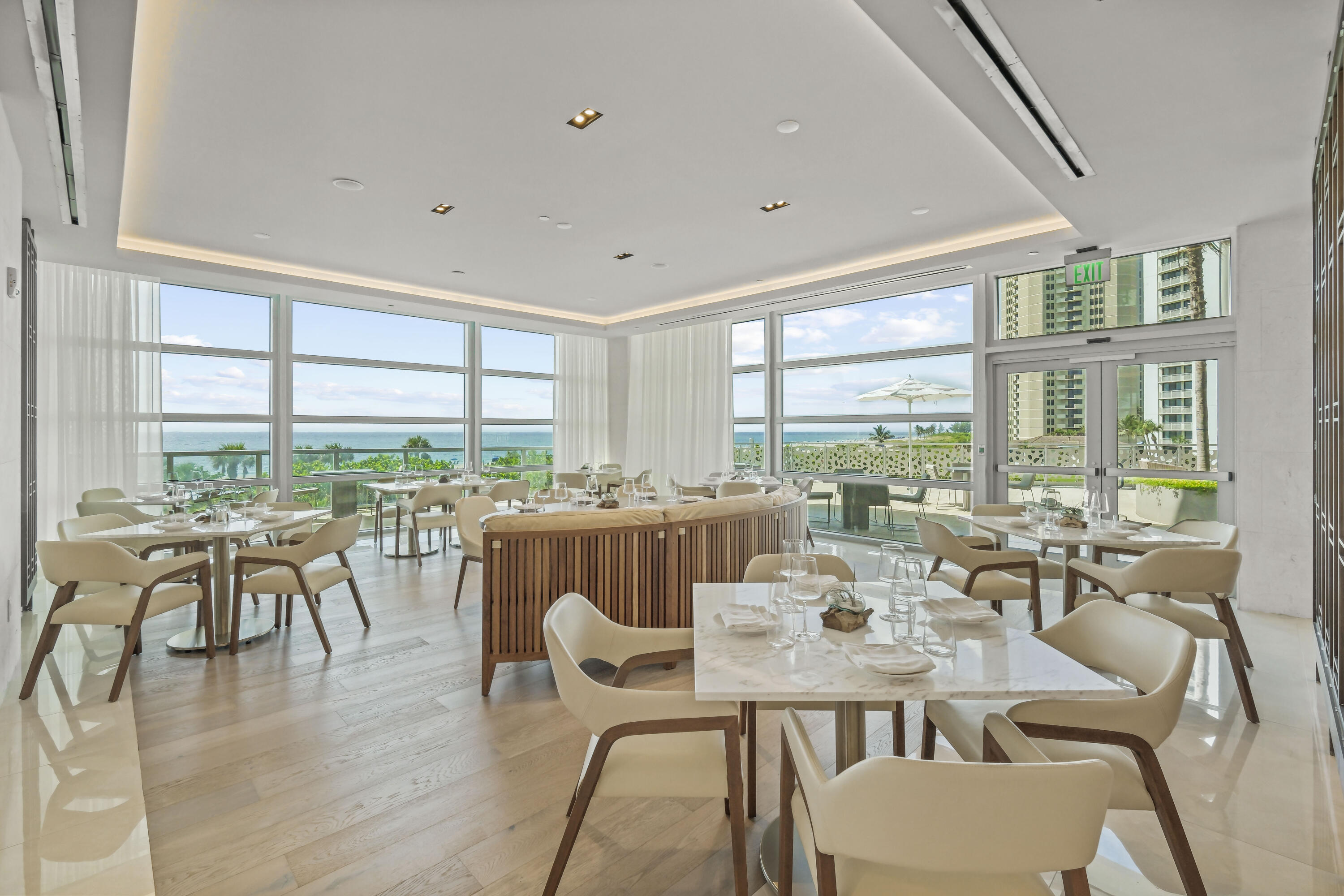 3100 North Ocean Drive, Unit H1610 Riviera Beach, FL 33404 - Photo 22 of 33 a view of a dining room with furniture window and outside view
