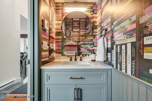 a view of a hallway with washer and dryer