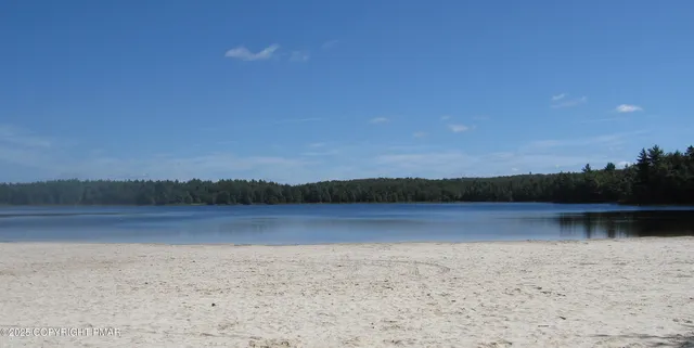 a view of lake and mountain