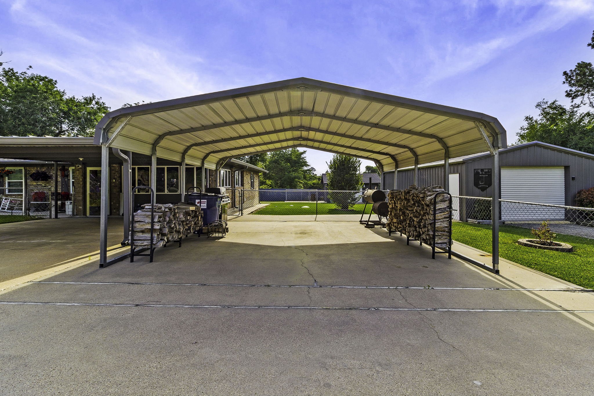 188 Huckleberry Road Onalaska, TX 77360 - Photo 5 of 49 a view of a house with a outdoor space