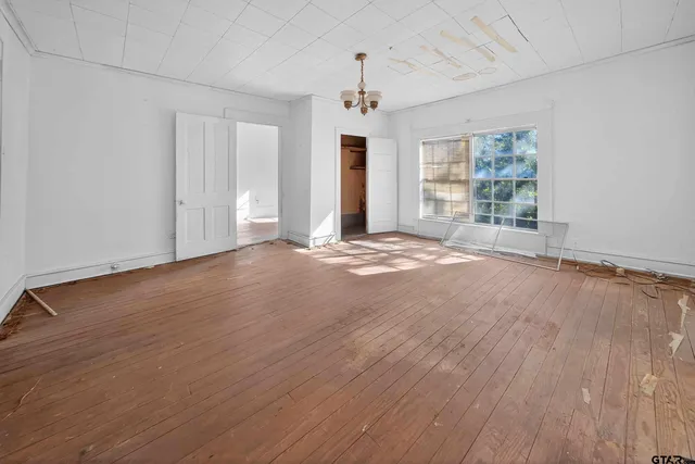 a view of a livingroom with a hardwood floor