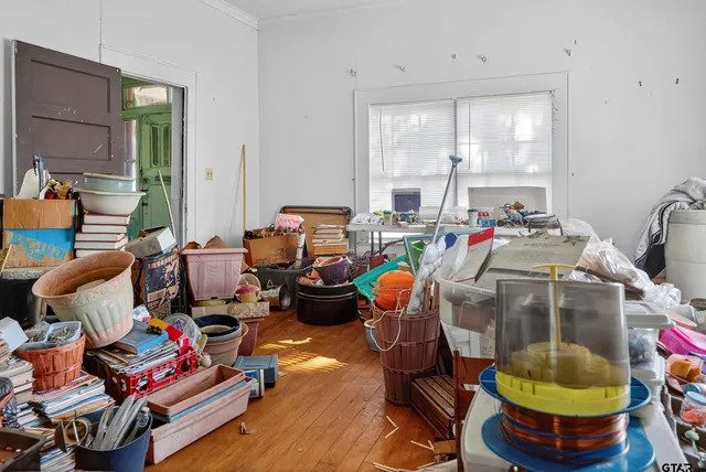 a room with gym equipment and a mirror