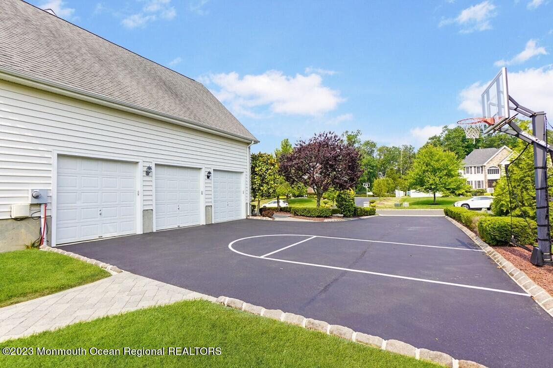15 Great Bridge Road Freehold, NJ 07728 - Photo 54 of 57 a view of a yard with a house