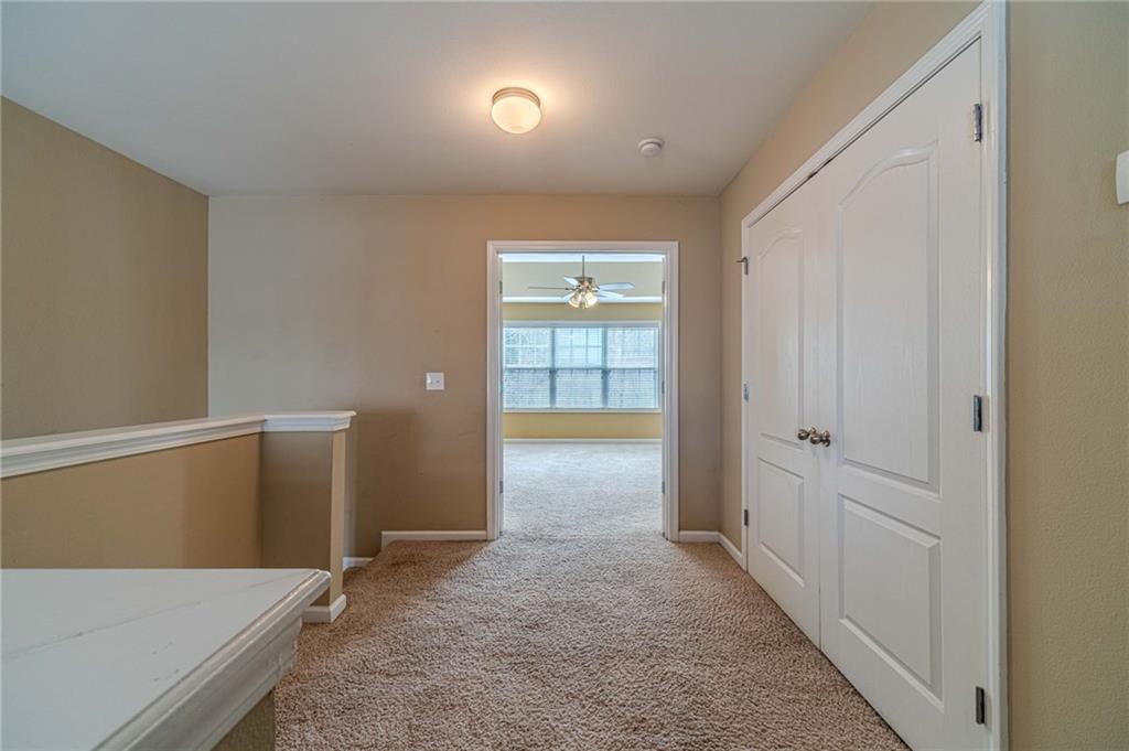 6503 Silk Tree Pointe Braselton, GA 30517 - Photo 22 of 47 wooden floor in an empty room with a window