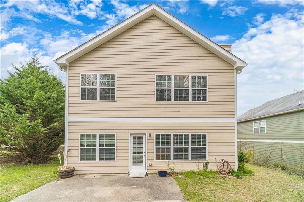 6503 Silk Tree Pointe Braselton, GA 30517 - Photo 42 of 47 a view of a house with a yard