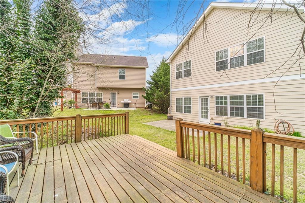 6503 Silk Tree Pointe Braselton, GA 30517 - Photo 43 of 47 a view of a deck with wooden floor and fence