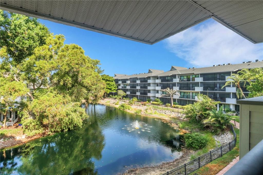 600 Neapolitan Way, Unit 345 Naples, FL 34103 - Photo 11 of 43 Water view with fence