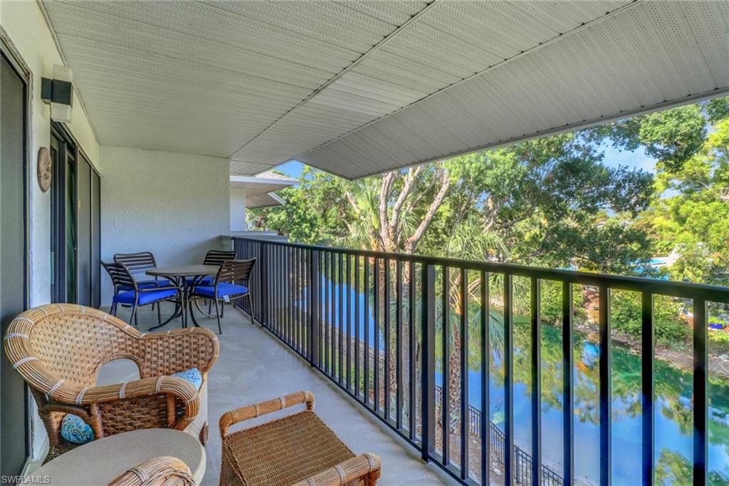 600 Neapolitan Way, Unit 345 Naples, FL 34103 - Photo 8 of 43 View of balcony