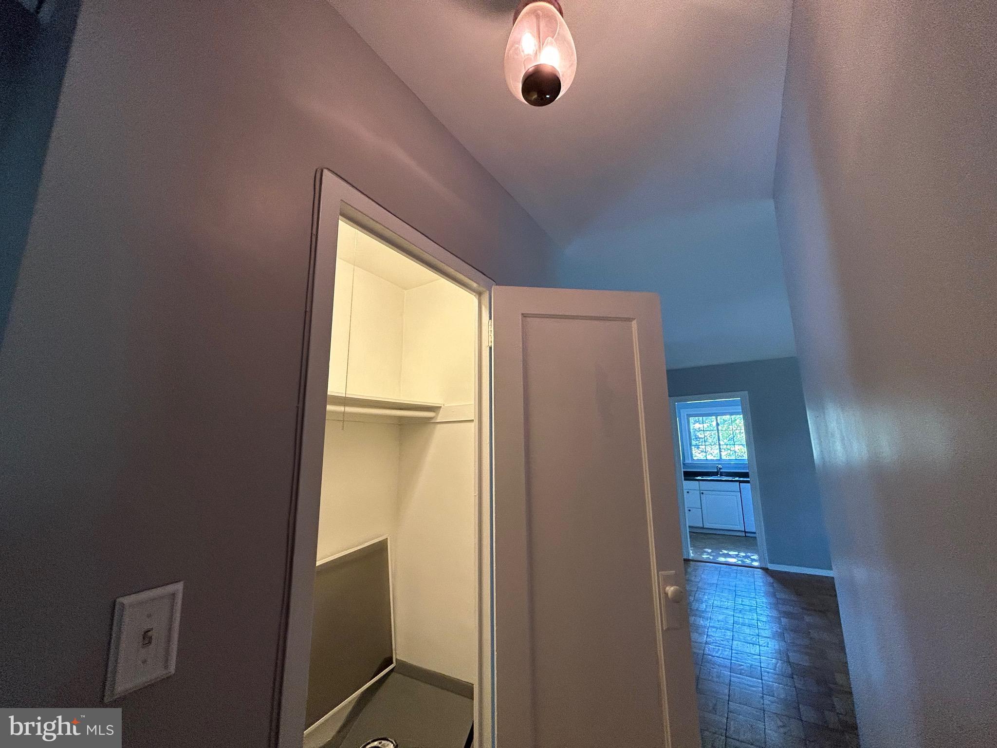 3318 Coryell Lane Alexandria, VA 22302 - Photo 24 of 29 a view of an empty room with wooden floor and a window
