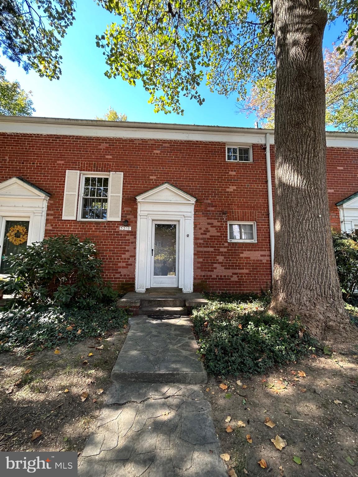 3318 Coryell Lane Alexandria, VA 22302 - Photo 28 of 29 a front view of a house with a yard