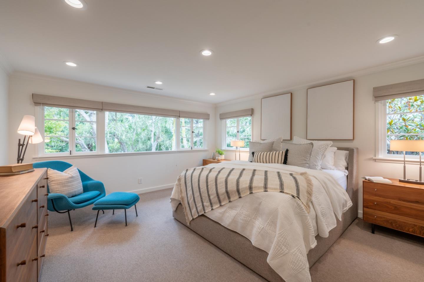 0 SE Corner Monte Verde & Third Carmel, CA 93921 - Photo 11 of 28 a spacious bedroom with a bed and a large window