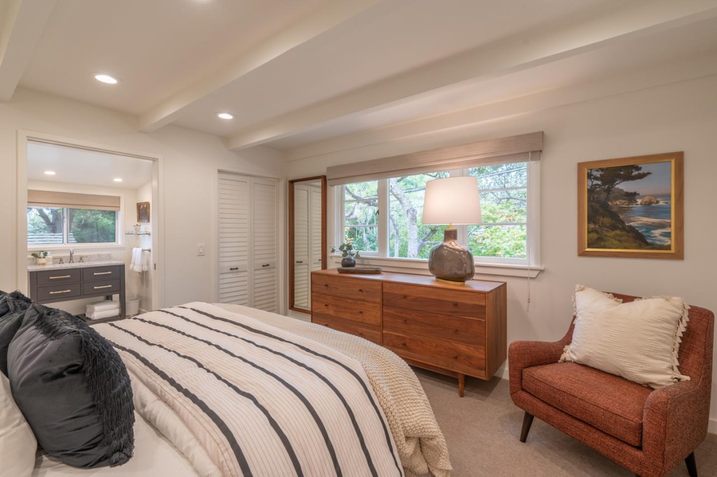 0 SE Corner Monte Verde & Third Carmel, CA 93921 - Photo 13 of 28 a bedroom with a bed and a large window