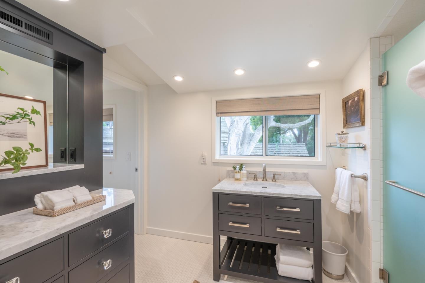 0 SE Corner Monte Verde & Third Carmel, CA 93921 - Photo 14 of 28 a bathroom with a granite countertop sink and a window