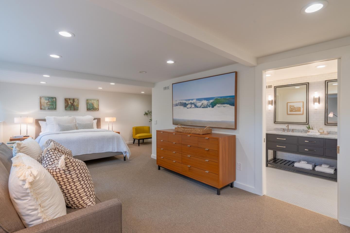 0 SE Corner Monte Verde & Third Carmel, CA 93921 - Photo 17 of 28 a spacious bedroom with a bed and a couch