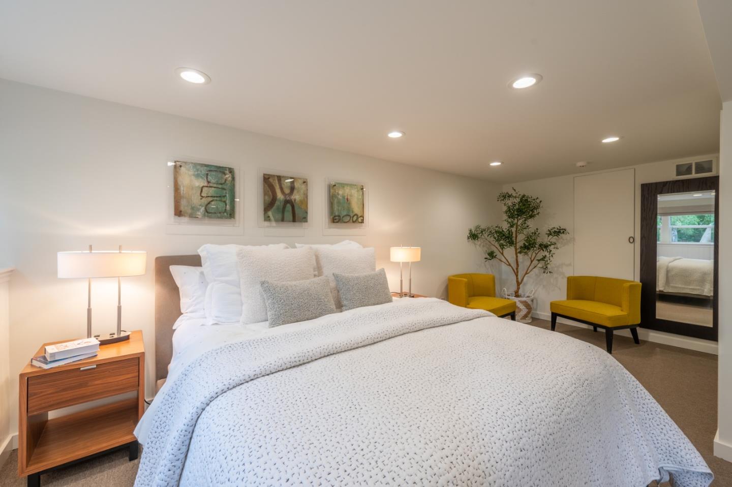 0 SE Corner Monte Verde & Third Carmel, CA 93921 - Photo 18 of 28 a bedroom with bed and a couch