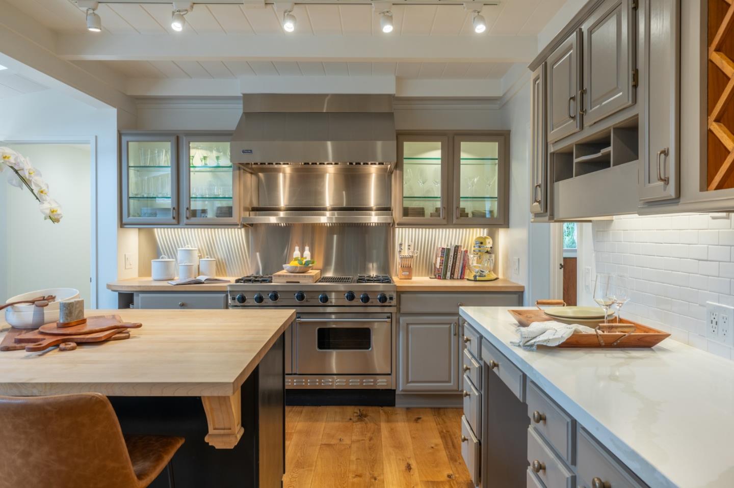 0 SE Corner Monte Verde & Third Carmel, CA 93921 - Photo 8 of 28 a kitchen with a stove a sink and a refrigerator